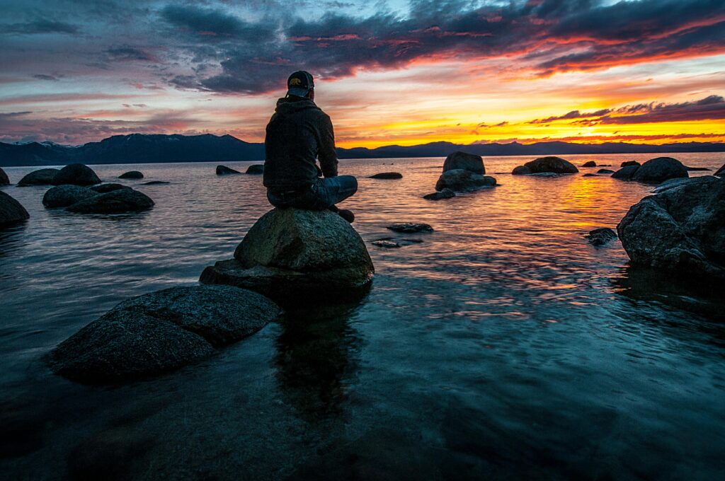 Peaceful scene of rocks in water.